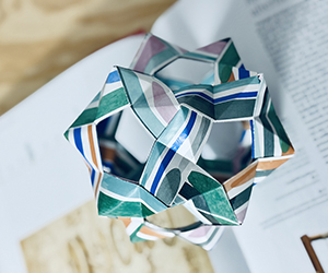 Interwoven Paths of Infinity — Polyhedra Origami